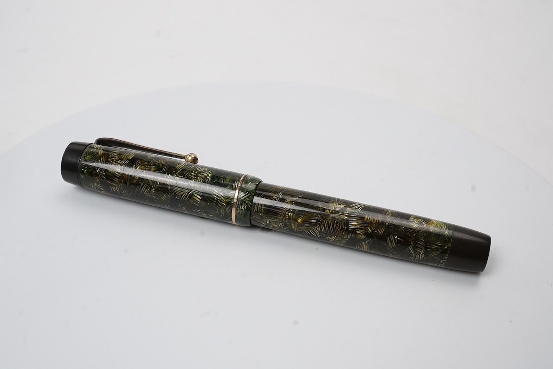 A Parker Senior UK Duofold 'green candy stripe' fountain pen with 14ct. gold 'N' nib